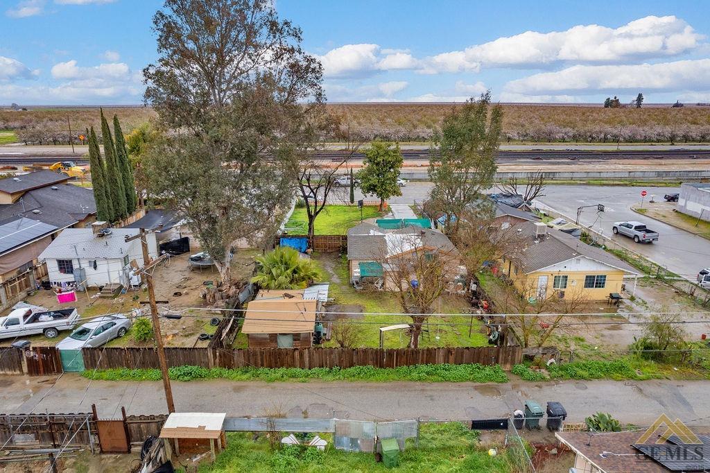 Undisclosed Address Wasco, CA 93280 - Photo 15 of 29 a view of multiple houses with yard