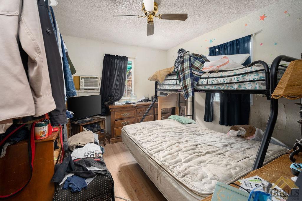 Undisclosed Address Wasco, CA 93280 - Photo 23 of 29 a bed sitting in a bedroom next to a window