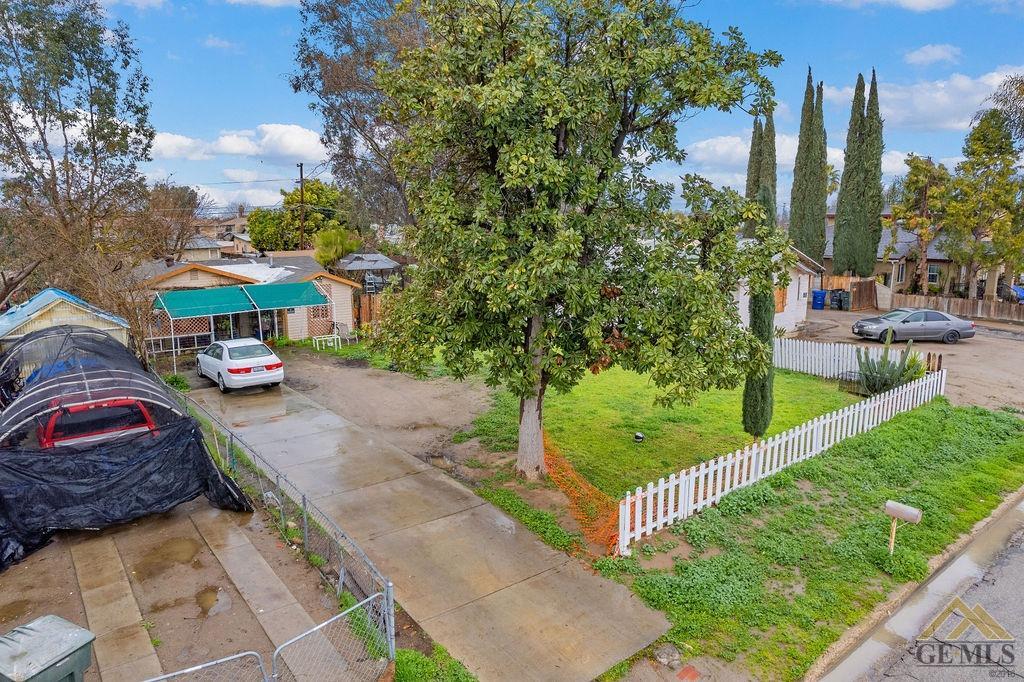 Undisclosed Address Wasco, CA 93280 - Photo 6 of 29 a cars parked on the side of the road