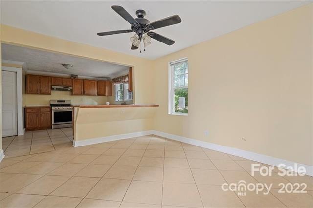 655 East Ridge Road Salisbury, NC 28144 - Photo 11 of 14 a view of a kitchen with a sink and a stove top oven