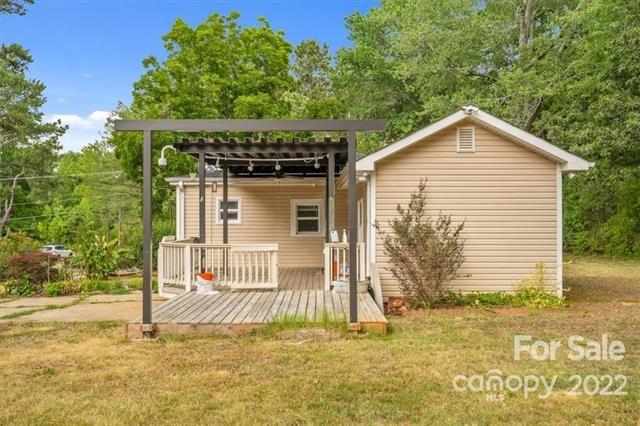 655 East Ridge Road Salisbury, NC 28144 - Photo 6 of 14 a front view of a house with a garden