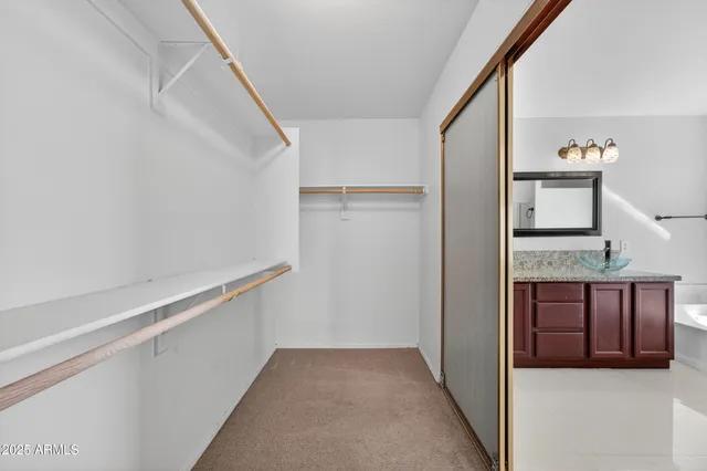 a view of a hallway with windows