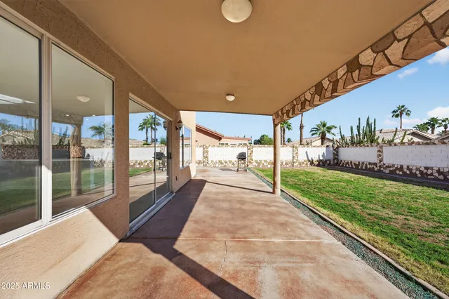 a view of a porch and garden