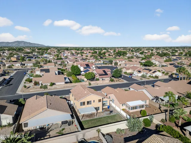an aerial view of a city with lots of residential buildings