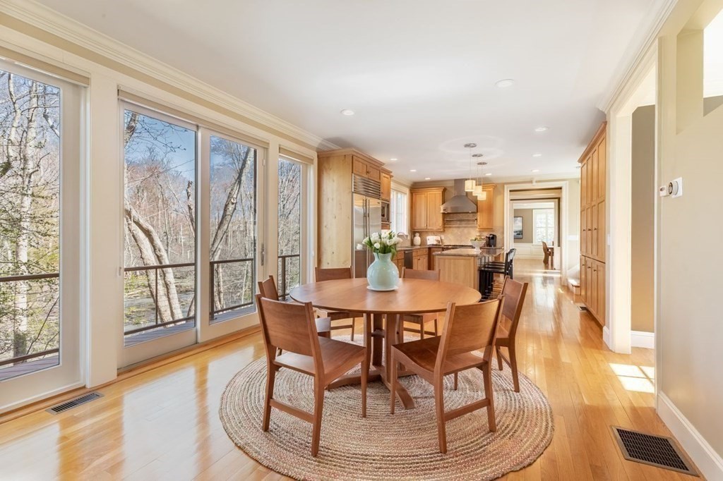 3 Solomon Pierce Road Lexington, MA 02420 - Photo 4 of 18 a view of a dining room with furniture window and wooden floor