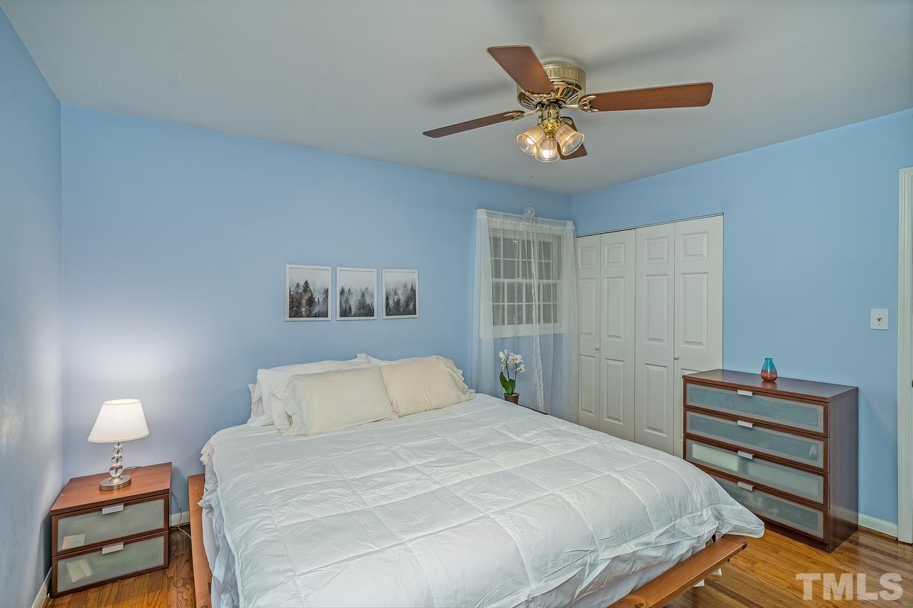 505 Old Farm Road Raleigh, NC 27606 - Photo 15 of 22 a bedroom with a bed and window