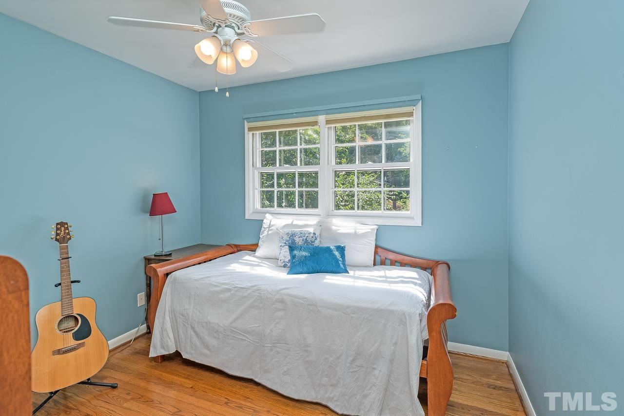 505 Old Farm Road Raleigh, NC 27606 - Photo 18 of 22 a bedroom with a bed and window