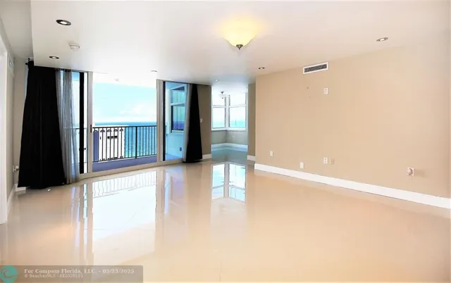 a view of an empty room with window