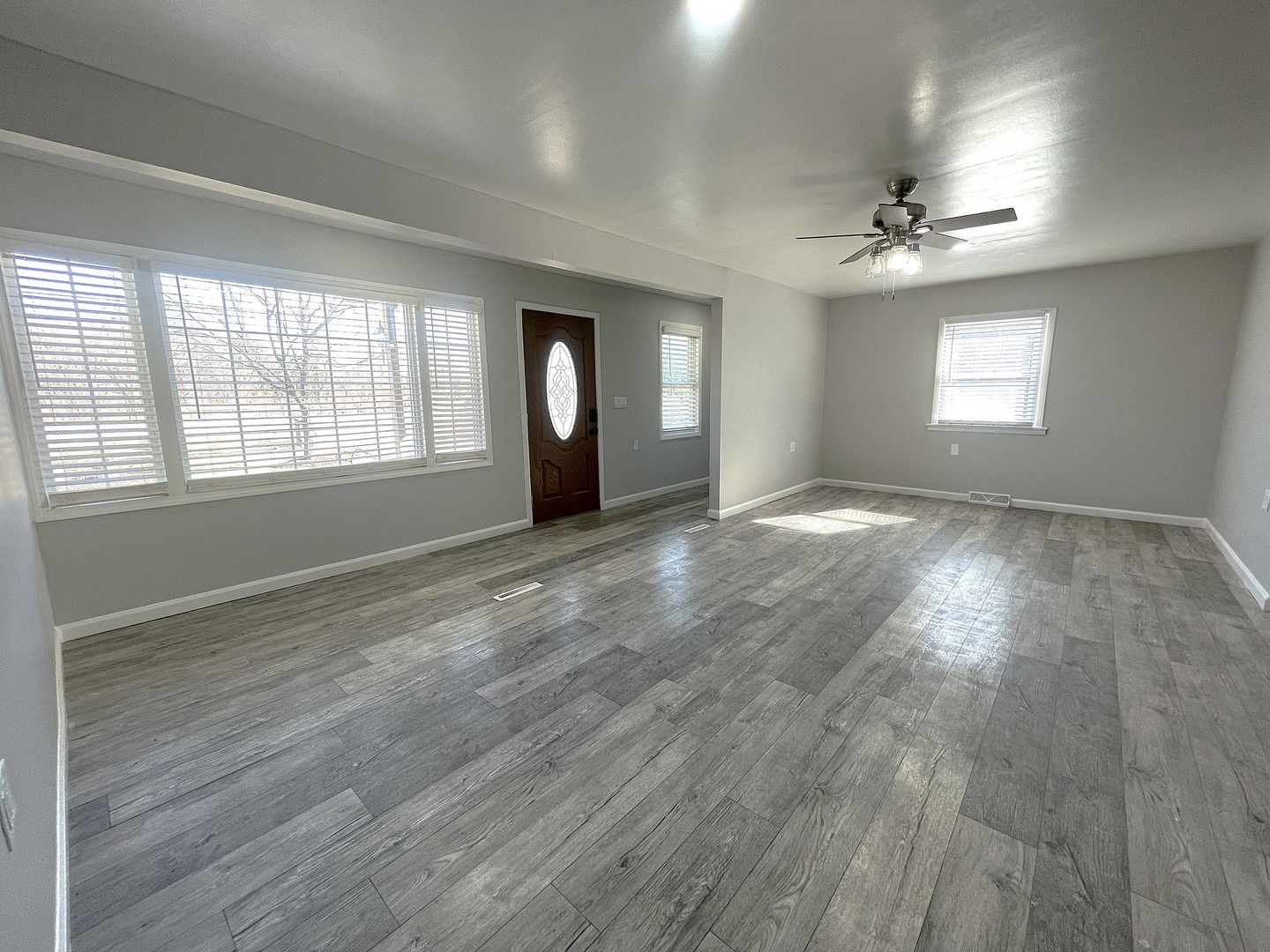 16058 South Gougar Road Homer Glen, IL 60491 - Photo 4 of 25 wooden floor in an empty room with a window