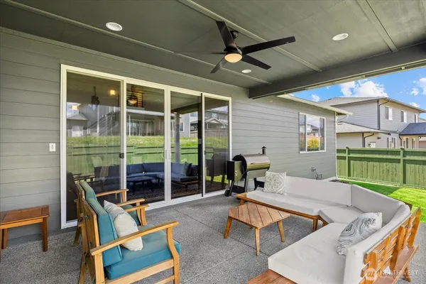 a outdoor space with patio the couches and a dining table with garden view