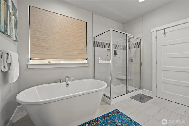 a bedroom with a bed and cabinets