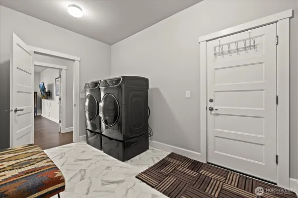 a bedroom with a bed and cabinets