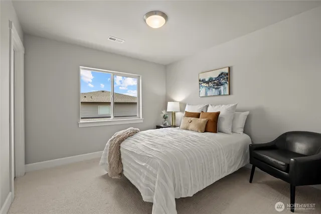 a bathroom with a sink double vanity and a mirror