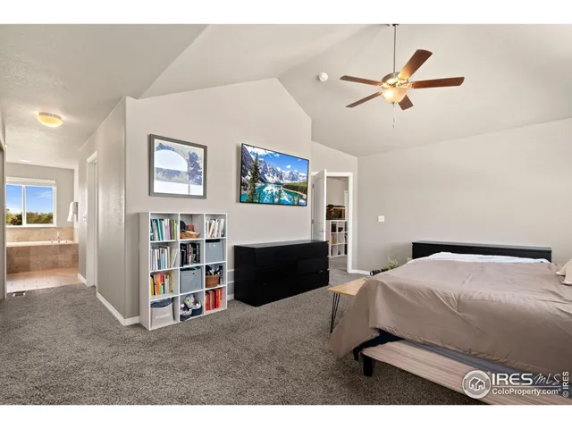 a bathroom with a sink double vanity granite and a mirror