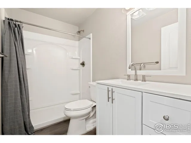 a view of a golf course with a lake