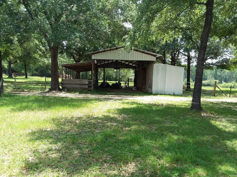 Tbd 7.5-ac Poverty Creek Road Crestview, FL 32539 - Photo 11 of 18 a view of a house with a yard