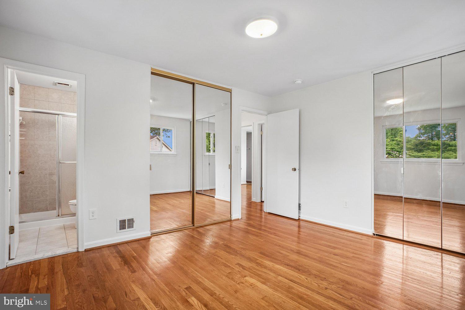 8933 Burke Lake Road Springfield, VA 22151 - Photo 26 of 47 Primary Bedroom, Large Mirrored Wall Closets