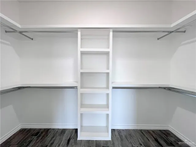 a view of an empty walk in closet