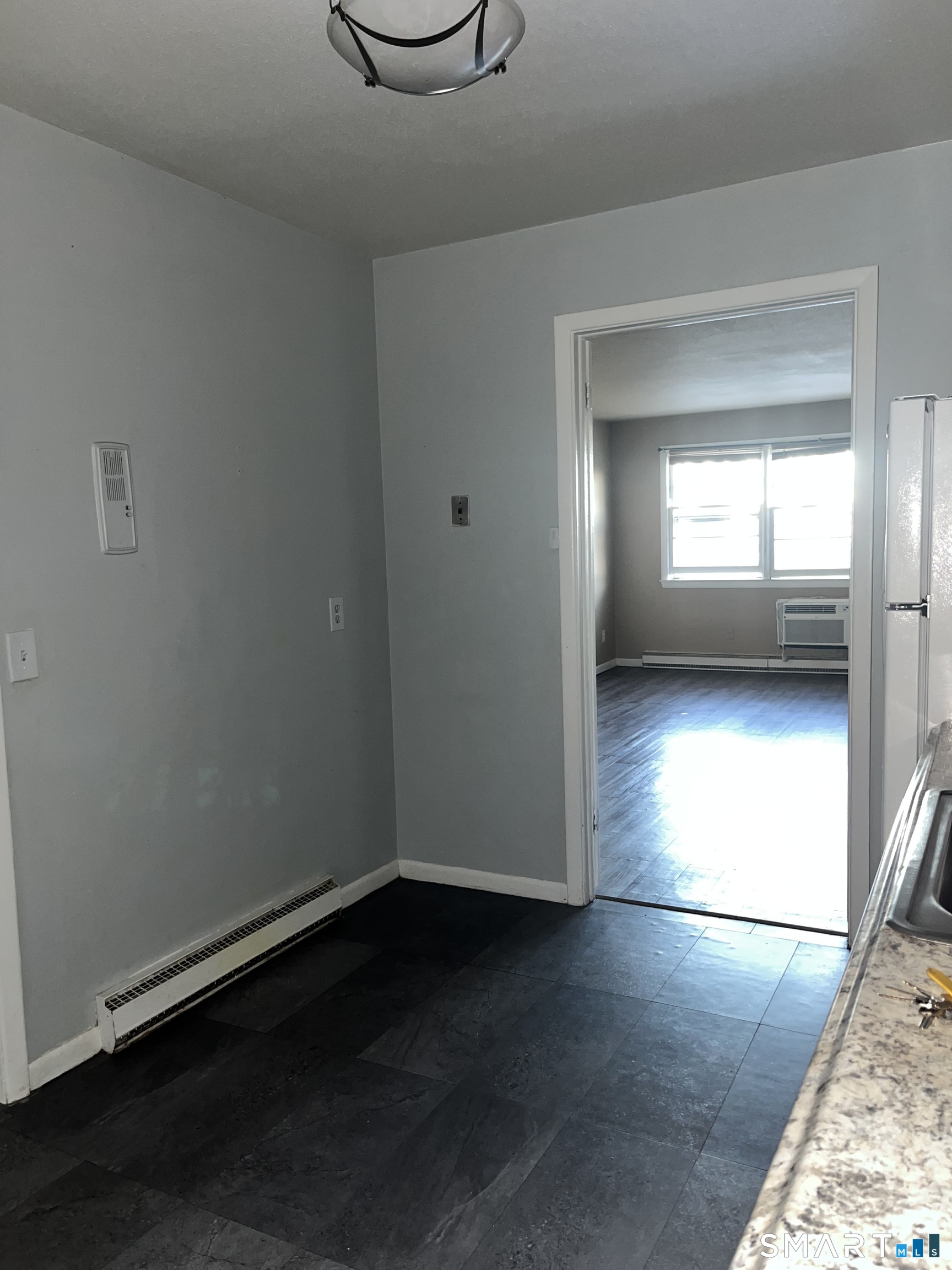 1730 State Street, Unit 407 Hamden, CT 06517 - Photo 3 of 8 a view of empty room with window
