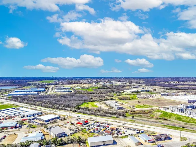 a view of a city with an ocean beach