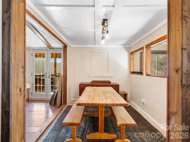 a view of a living room with a large window