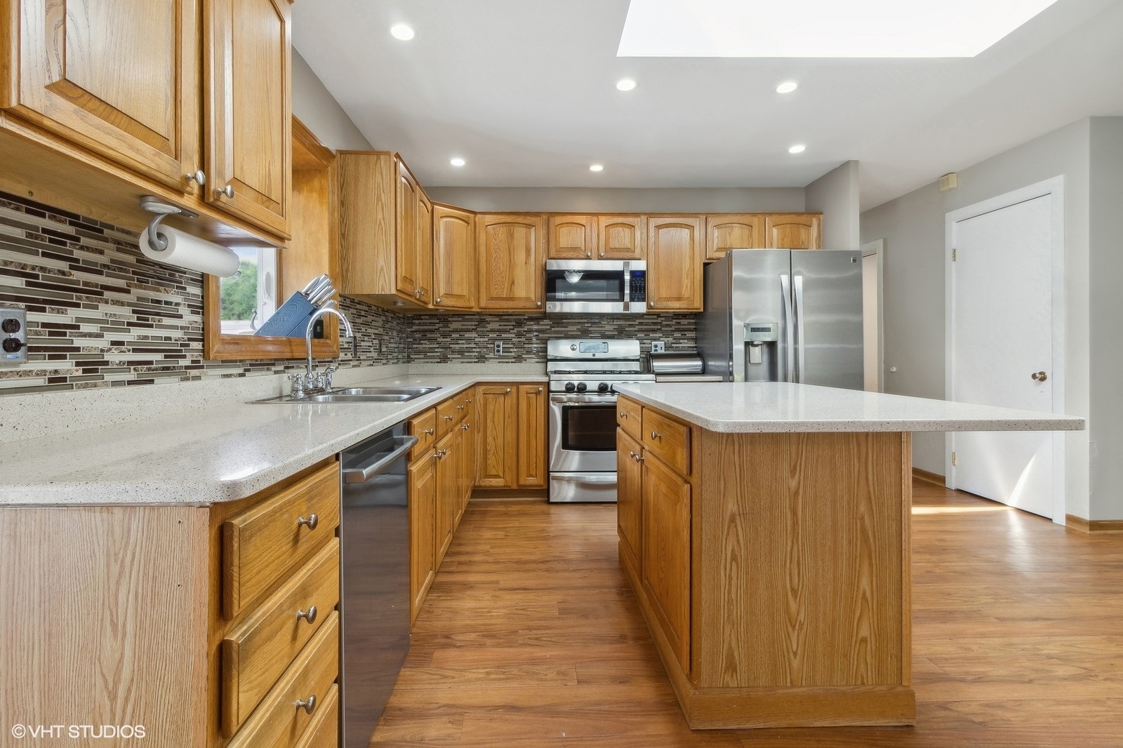 16 Old Post Road Montgomery, IL 60538 - Photo 5 of 21 a large kitchen with stainless steel appliances granite countertop a sink and counter space