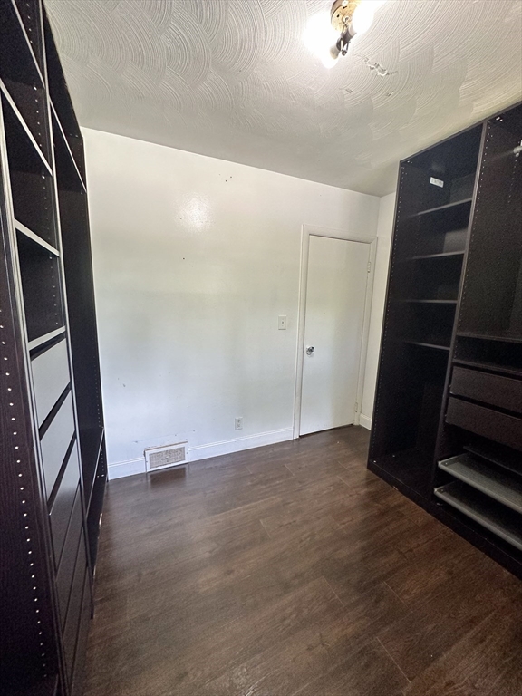 3 Intervale Road Springfield, MA 01118 - Photo 12 of 22 a view of an empty room with wooden floor and stairs