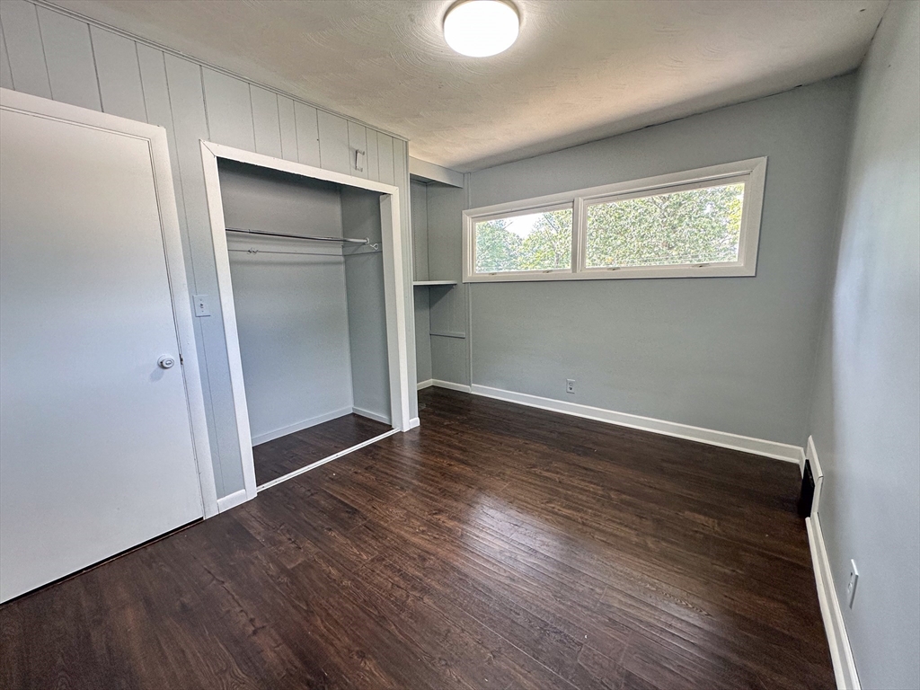 3 Intervale Road Springfield, MA 01118 - Photo 15 of 22 an empty room with wooden floor and windows