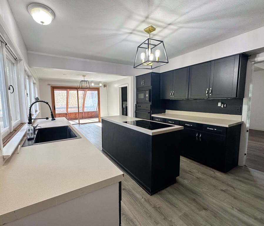 3 Intervale Road Springfield, MA 01118 - Photo 5 of 22 a kitchen with a sink appliances and cabinets
