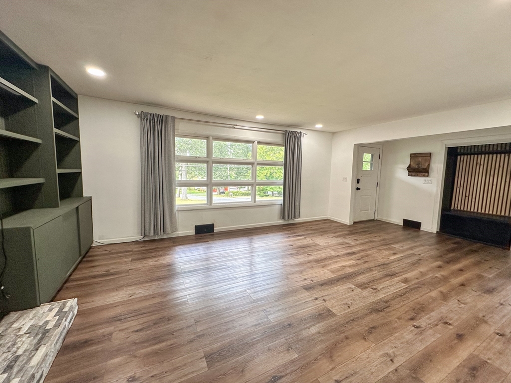 3 Intervale Road Springfield, MA 01118 - Photo 9 of 22 wooden floor in an empty room with a window