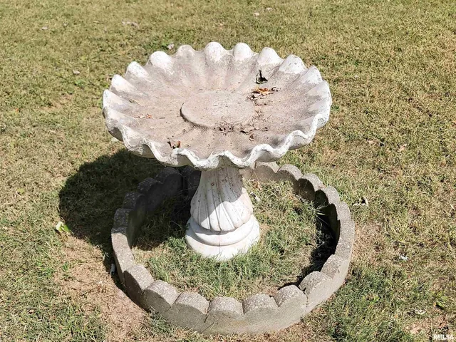 a view of a deck with a backyard