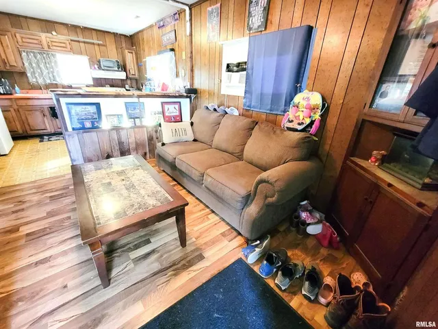 a living room with furniture and a table