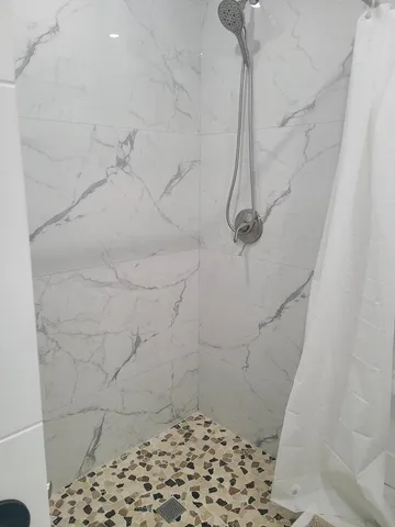 a bathroom with a shower