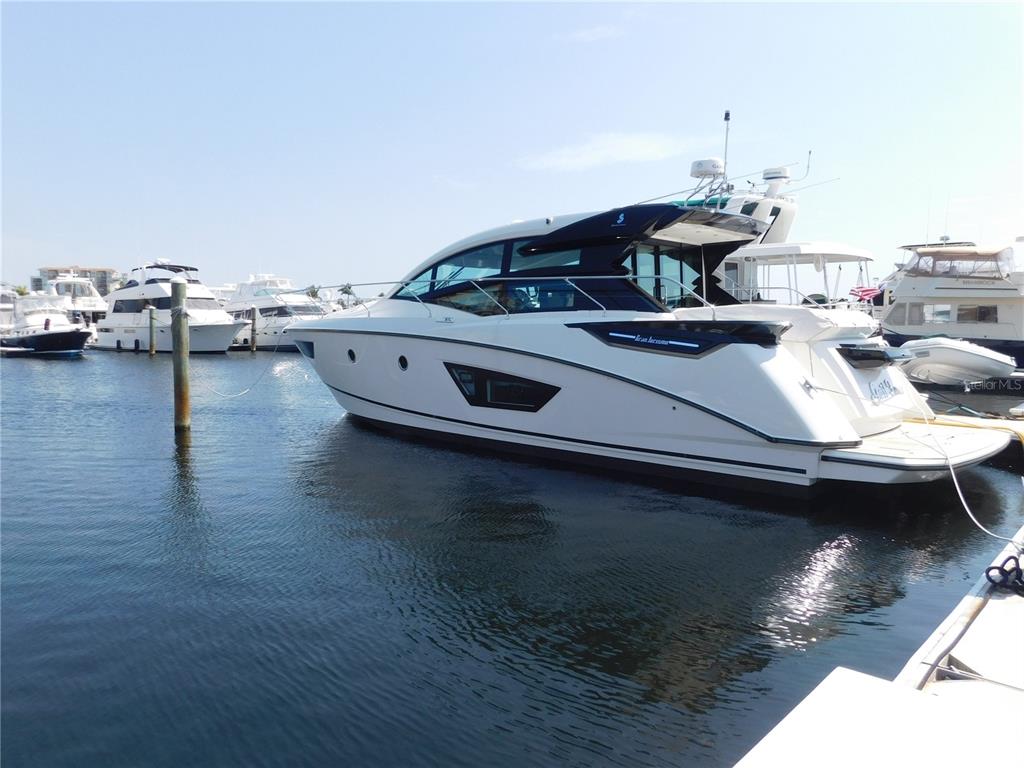 102 Riviera Dunes Way, Unit C10 Palmetto, FL 34221 - Photo 29 of 56 a view of a workspace with wooden floor