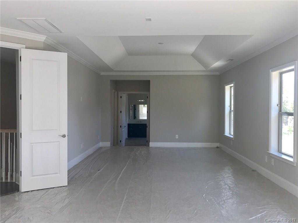 4013 Flowering Peach Road, Unit 9 Marvin, NC 28173 - Photo 11 of 12 an empty room with windows and closet