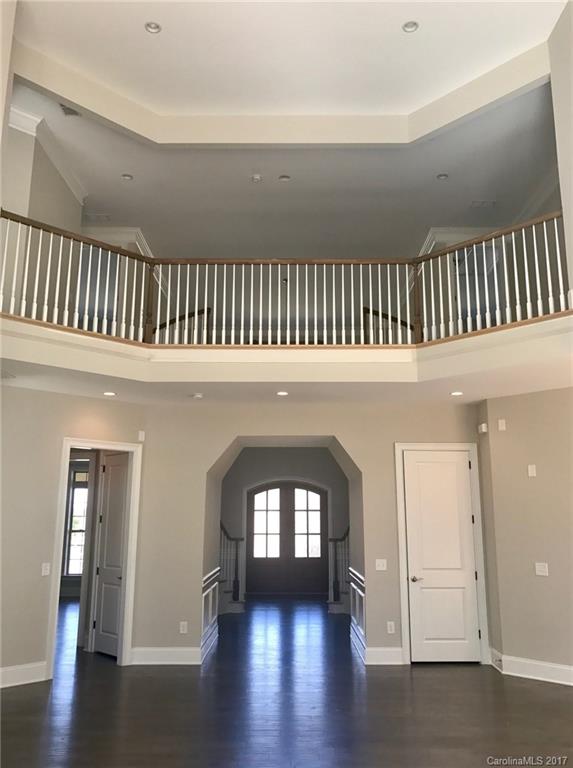 4013 Flowering Peach Road, Unit 9 Marvin, NC 28173 - Photo 12 of 12 wooden floor in hallway with a window
