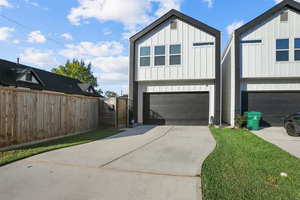 a front view of a house with yard