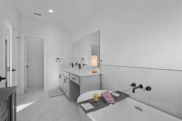 a bathroom with a sink and a tub