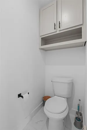 a bathroom with a toilet