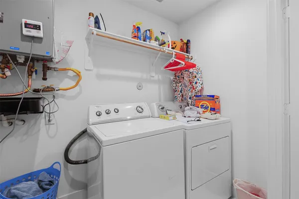a storage room with washer and dryer