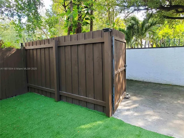 a view of backyard with tree