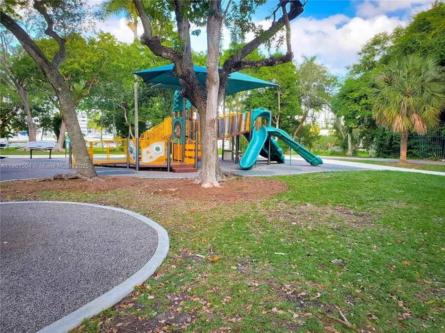 a view of a park with slide