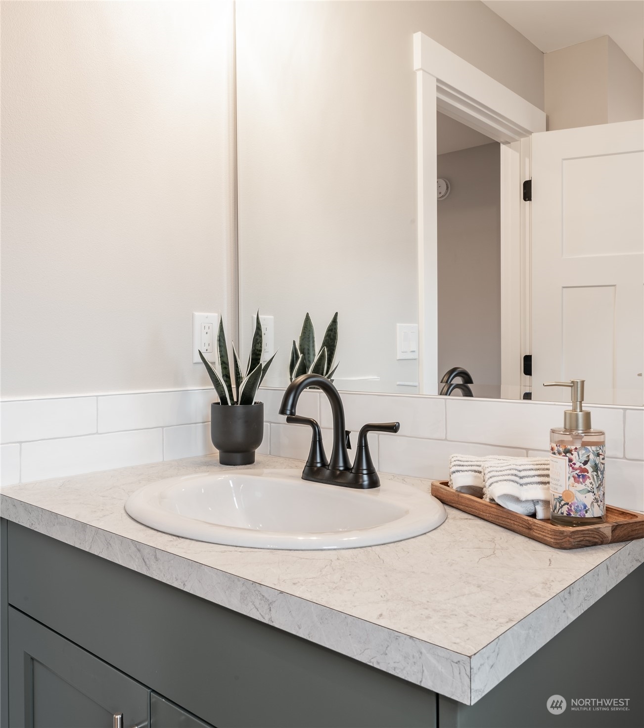 1509 Hovel Road Sumas, WA 98295 - Photo 24 of 38 a bathroom with a sink and a mirror