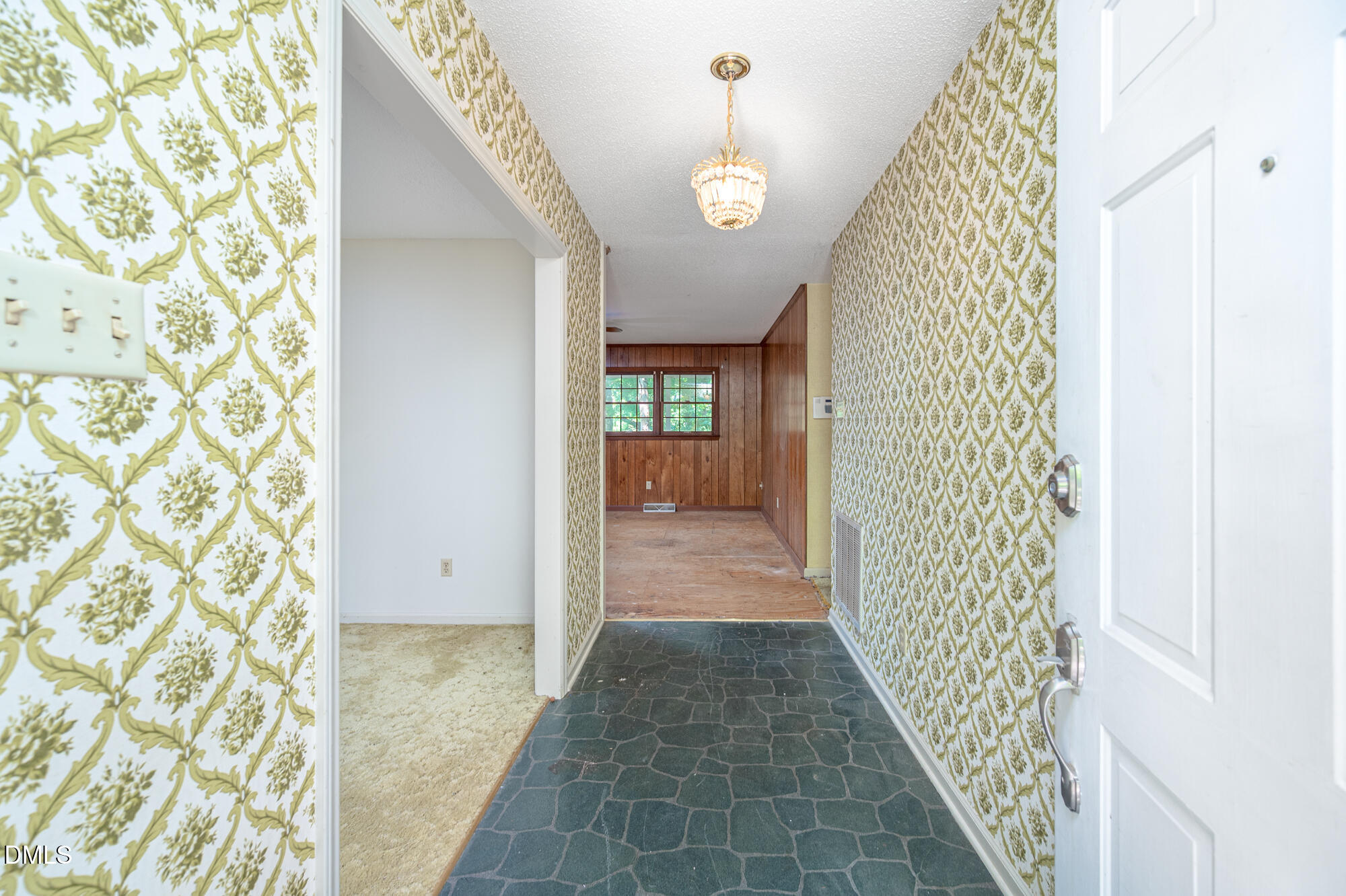 4411 Rhew Drive Durham, NC 27704 - Photo 7 of 34 a view of a hallway view with staircase