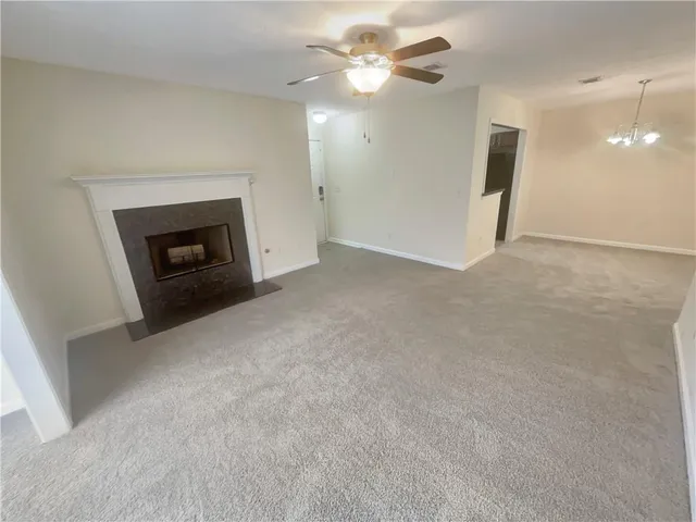 a view of a livingroom with a fireplace