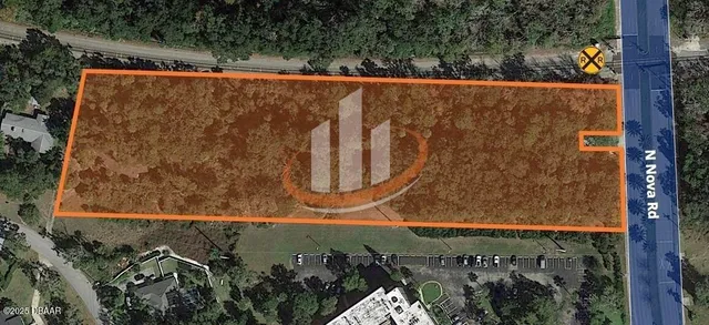 a aerial view of residential houses with street