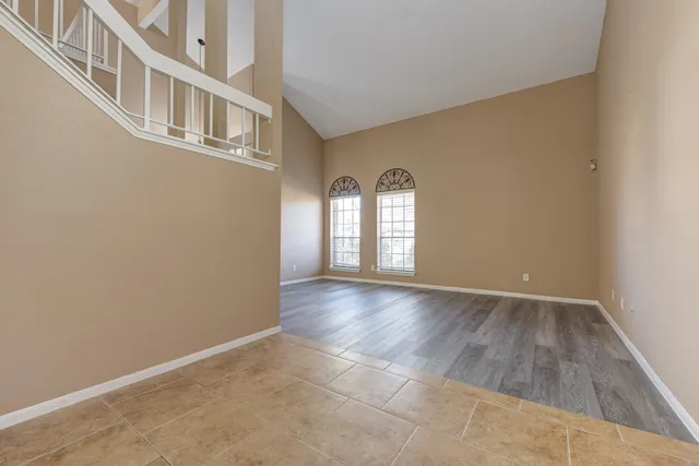 an empty room with windows