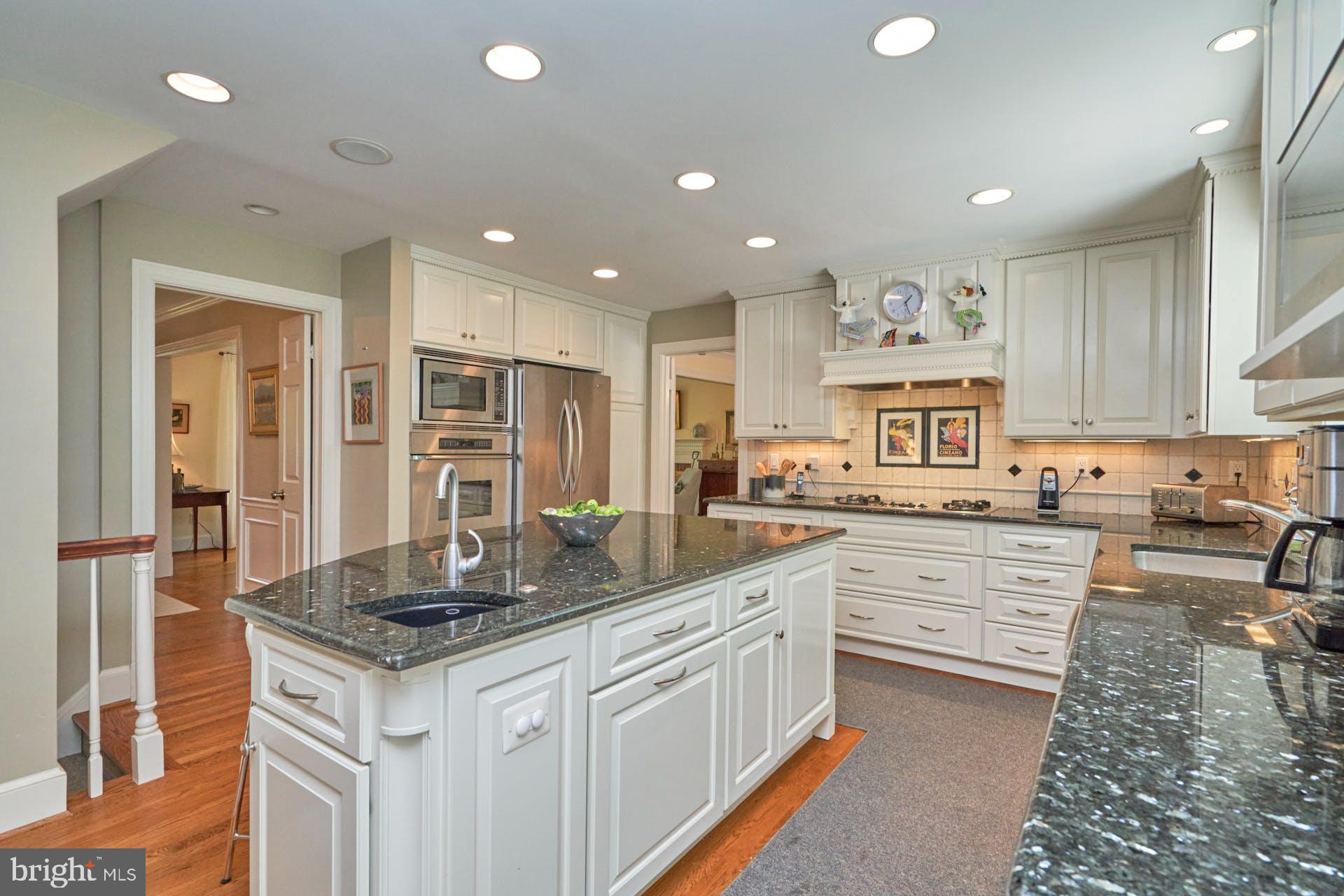 1235 Aldebaran Drive McLean, VA 22101 - Photo 15 of 71 Island w/prep sink & disposal, storage, & seating