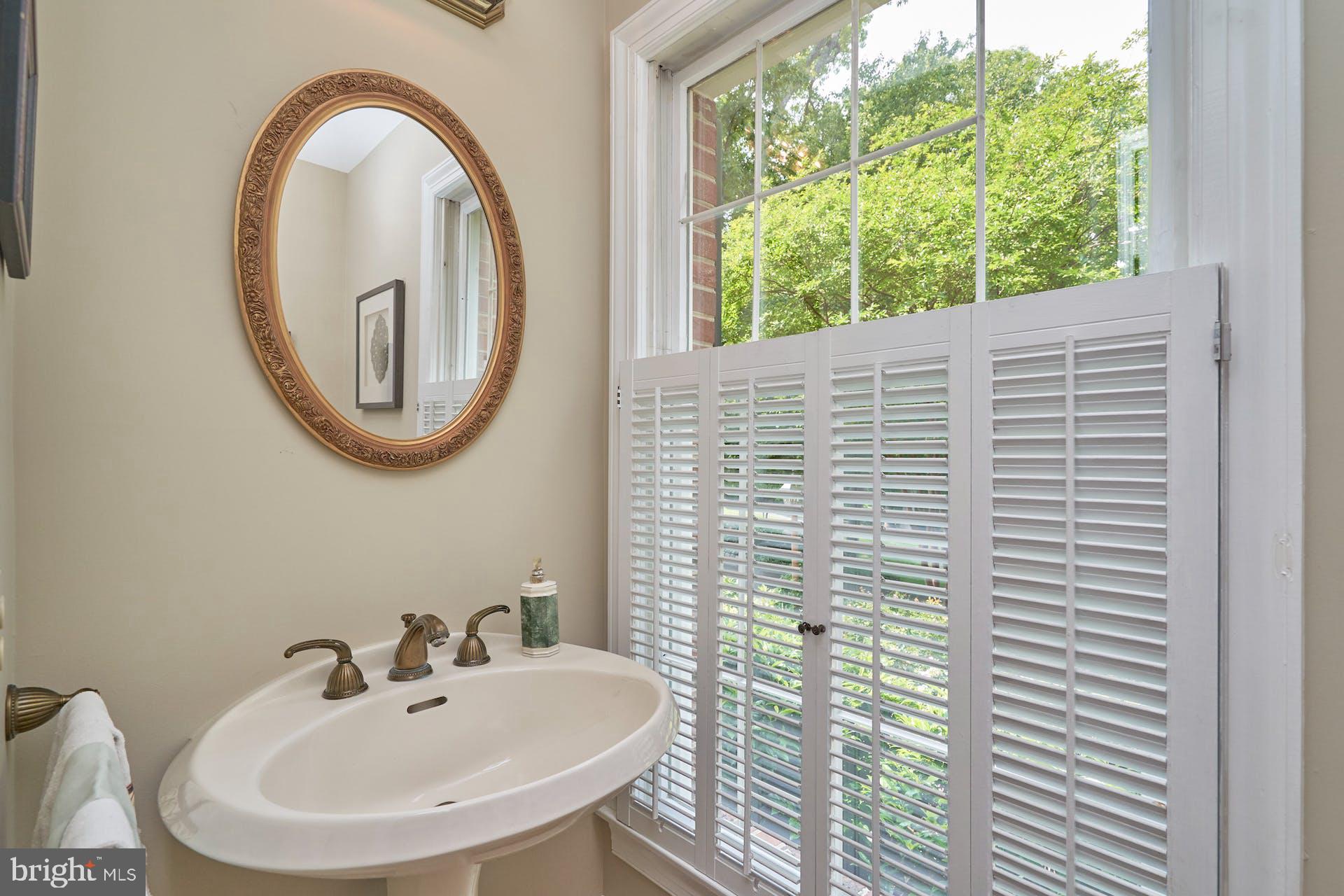 1235 Aldebaran Drive McLean, VA 22101 - Photo 24 of 71 Powder room w/pedestal sink & plantation shutters.