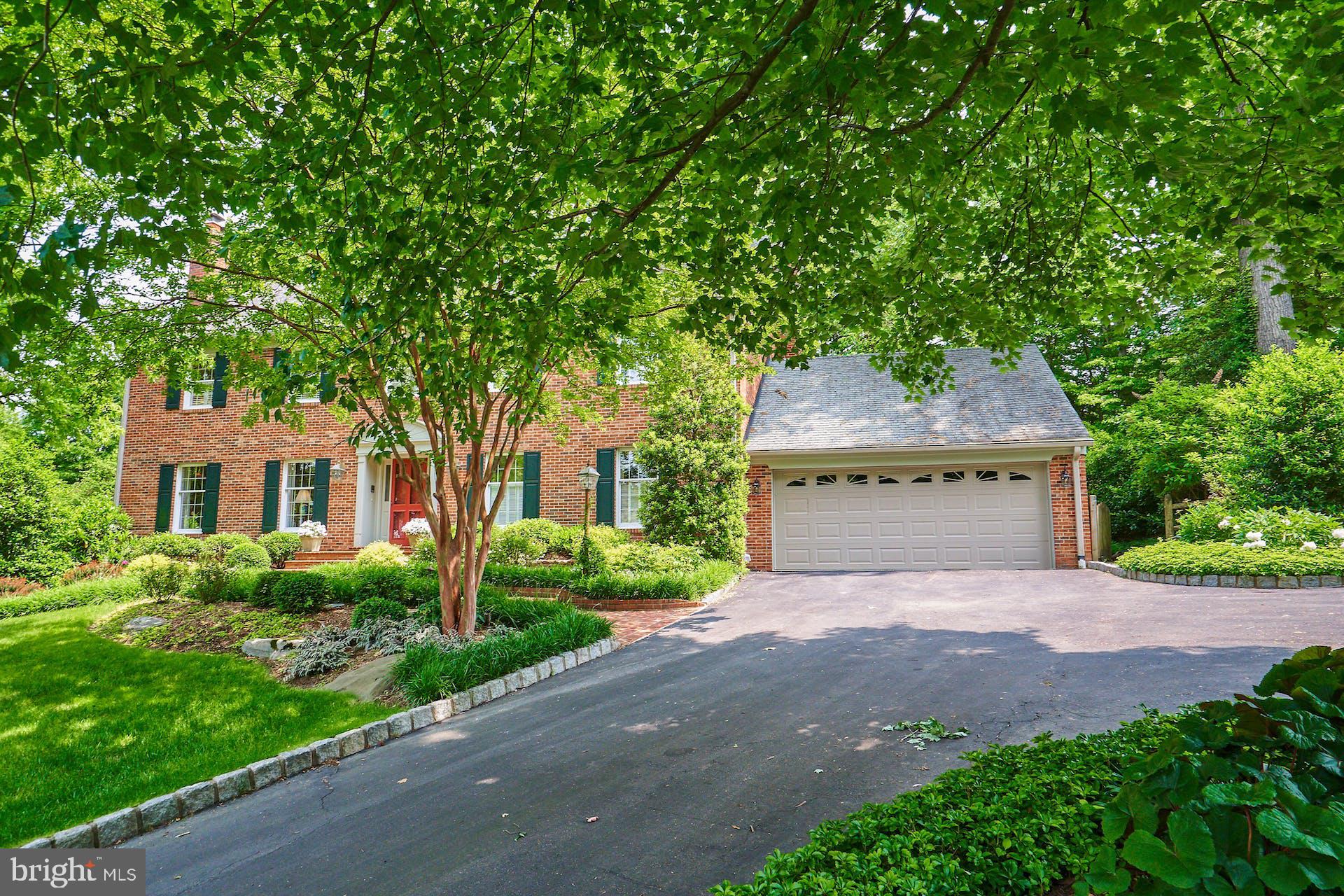 1235 Aldebaran Drive McLean, VA 22101 - Photo 3 of 71 Brick exterior. 2-car garage w/ extra parking pad